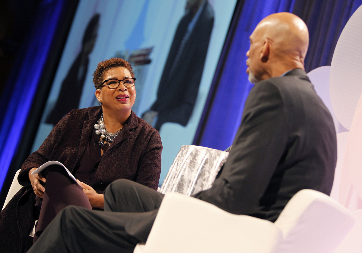 Michel Martin, left, weekend host of NPR's All Things Considered, interviews NBA legend Kareem Abdul-Jabbar at the National Building Museum as part of NPR's annual Weekend in Washington on Friday, October 30, 2015 in Washington, DC. (Paul Morigi/AP Images for NPR)